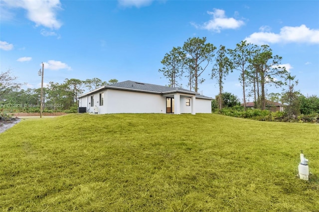 exterior space with a lawn