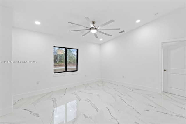 unfurnished room with ceiling fan