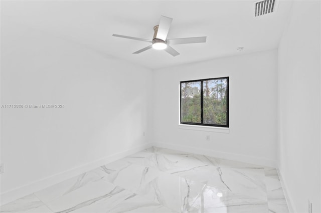 spare room featuring ceiling fan