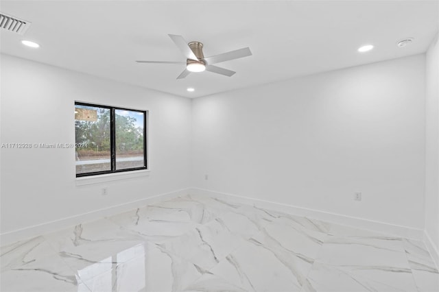 unfurnished room featuring ceiling fan