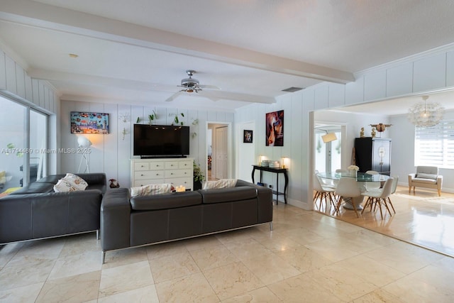 living room with beamed ceiling and ceiling fan