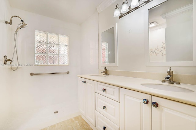 bathroom featuring vanity and walk in shower