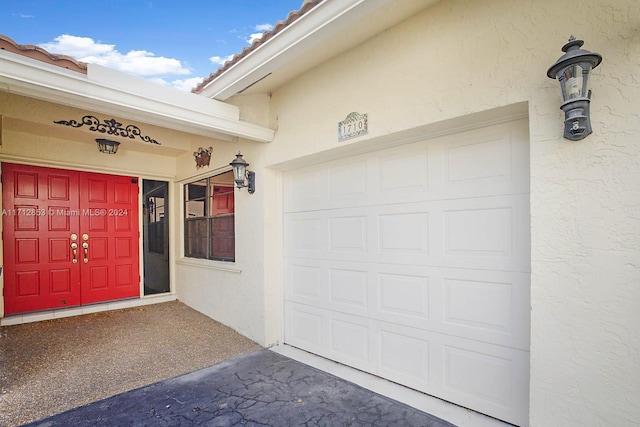 entrance to property with a garage