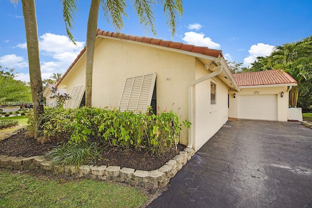 view of home's exterior with a garage