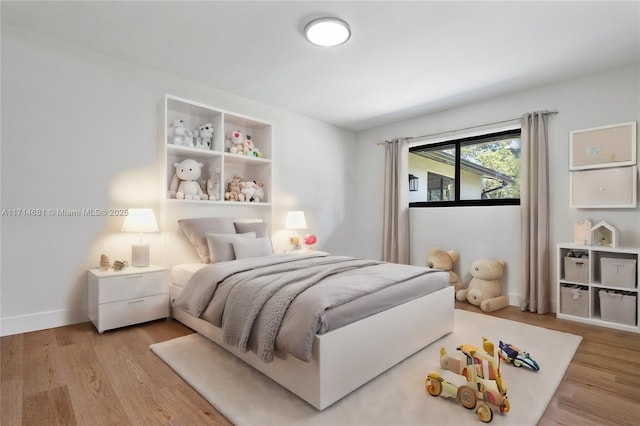 bedroom featuring light hardwood / wood-style flooring