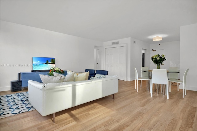 living room featuring light wood-type flooring