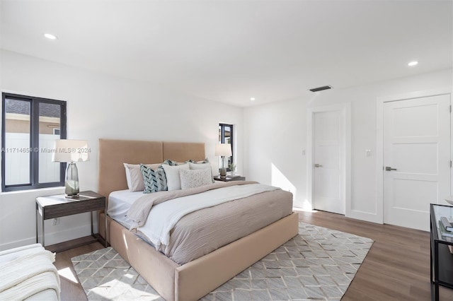 bedroom featuring light hardwood / wood-style flooring