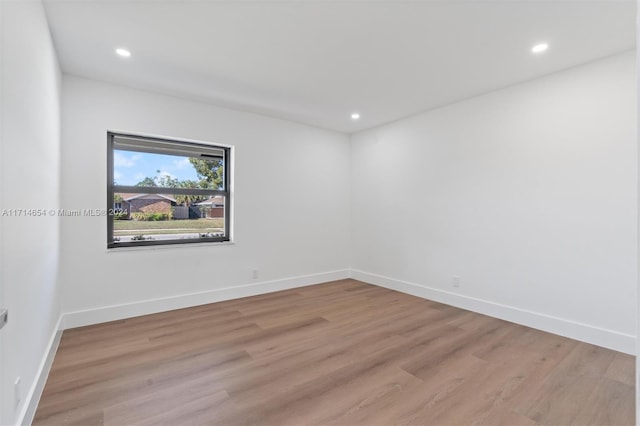 empty room with light wood-type flooring