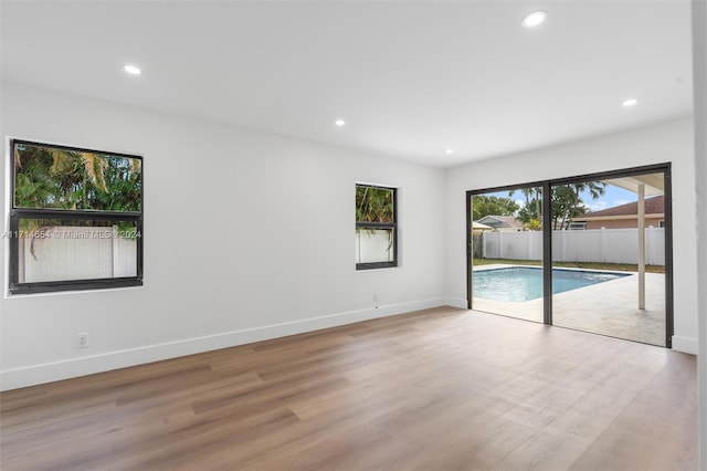 empty room featuring light hardwood / wood-style floors