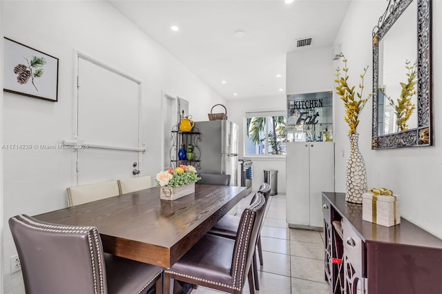 dining space with light tile patterned flooring