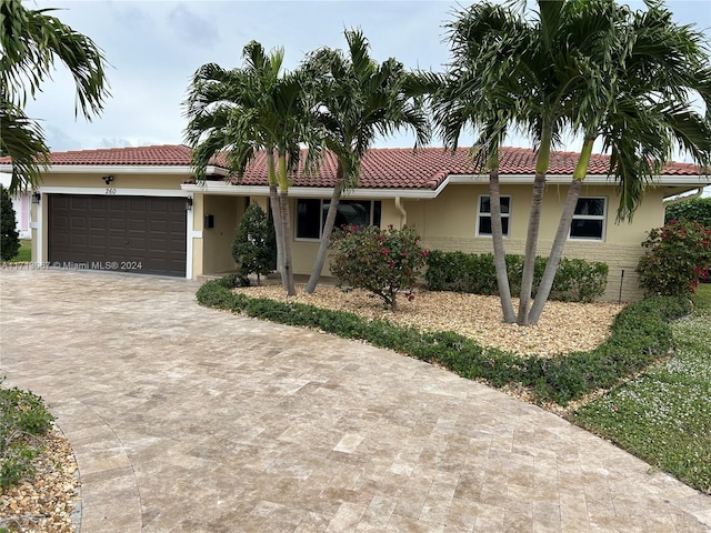 view of front of property with a garage