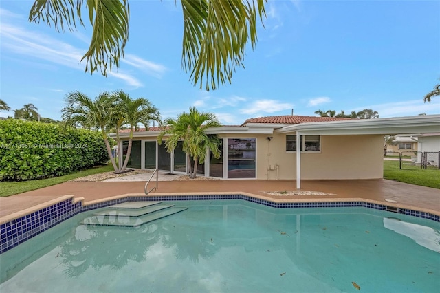 view of pool featuring a patio area