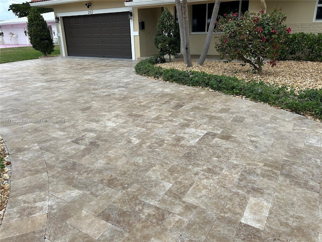 exterior space with a garage