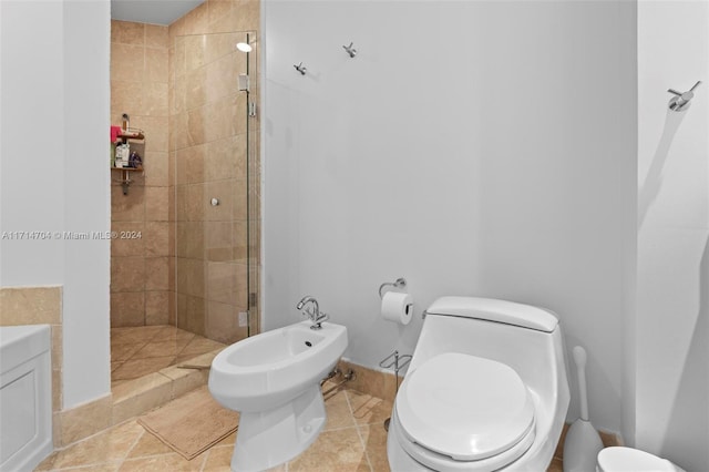 bathroom with a tile shower, a bidet, and toilet