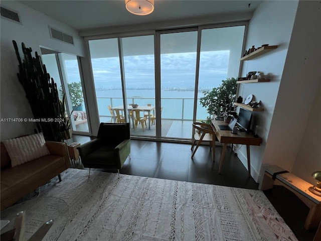 living room with floor to ceiling windows