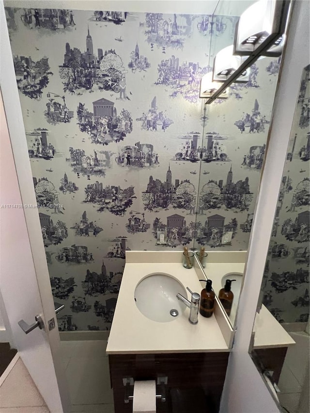 bathroom featuring tile patterned floors and vanity