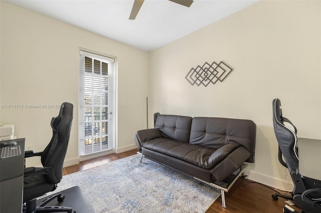 home office with ceiling fan and hardwood / wood-style floors