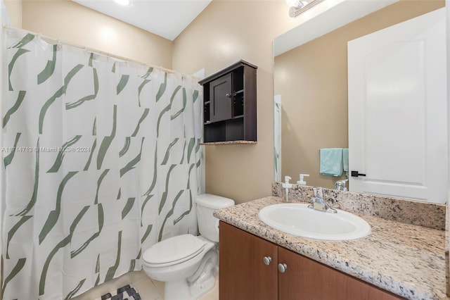 bathroom featuring tile patterned floors, vanity, toilet, and a shower with shower curtain