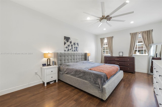 bedroom with ceiling fan and dark wood-type flooring