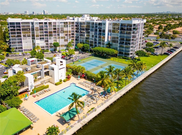 birds eye view of property with a water view