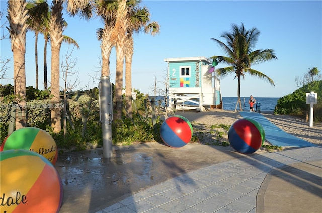 view of playground featuring a water view