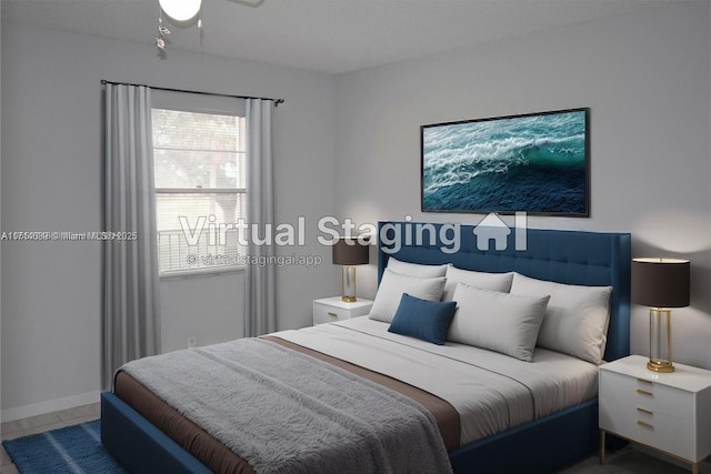 bedroom with tile patterned flooring and ceiling fan