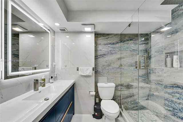 bathroom with vanity, an enclosed shower, tile walls, and toilet