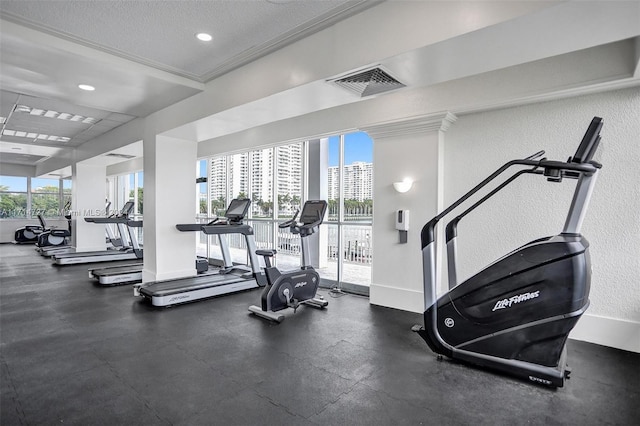 exercise room featuring a textured ceiling