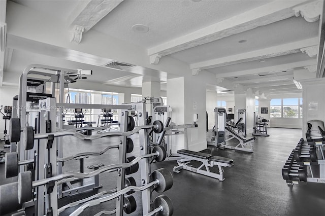 workout area featuring a textured ceiling