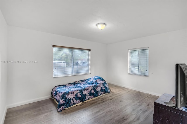 bedroom featuring hardwood / wood-style flooring