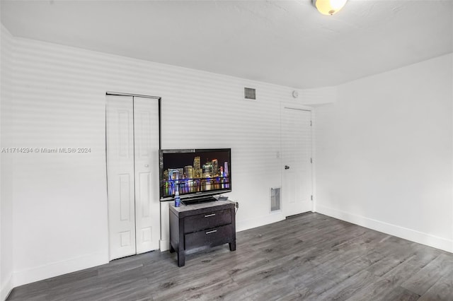 living room featuring dark wood-type flooring