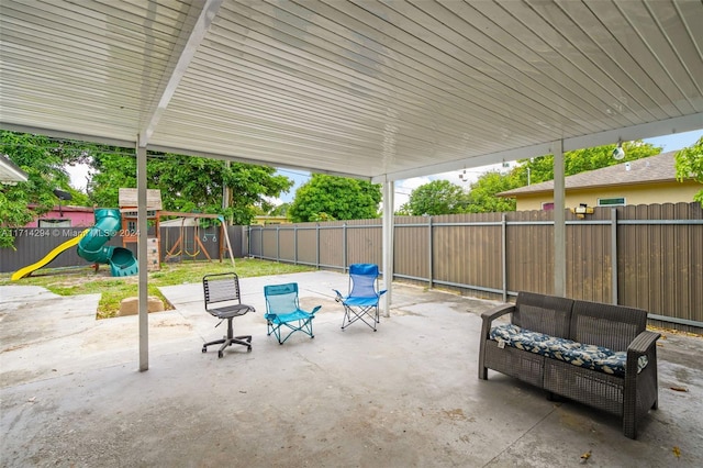 view of patio / terrace with a playground and an outdoor living space