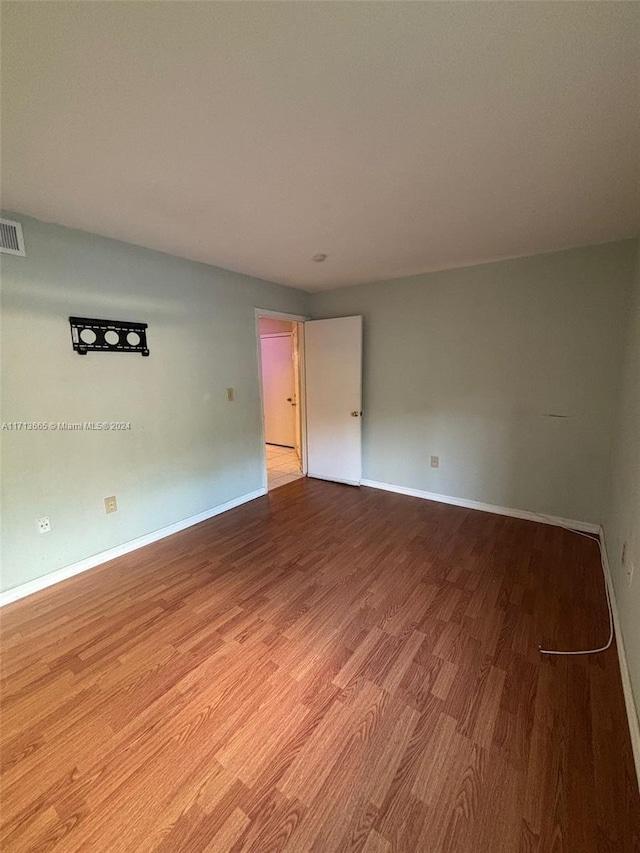 empty room featuring light hardwood / wood-style floors