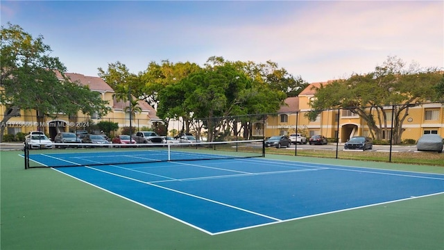 view of tennis court with basketball court