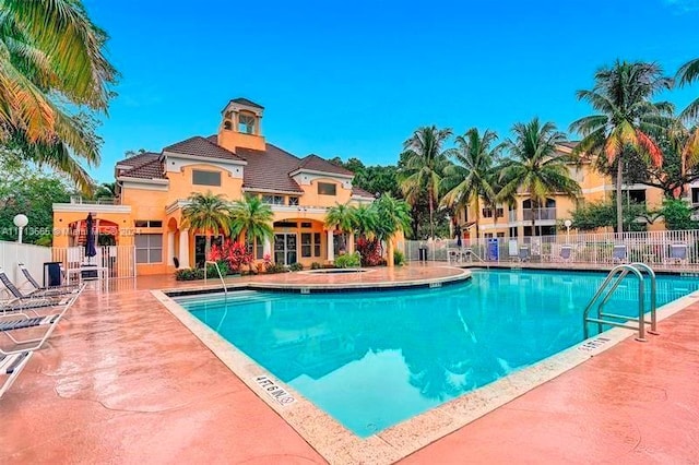 view of swimming pool featuring a patio