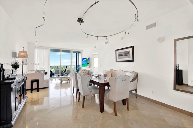 dining area with expansive windows