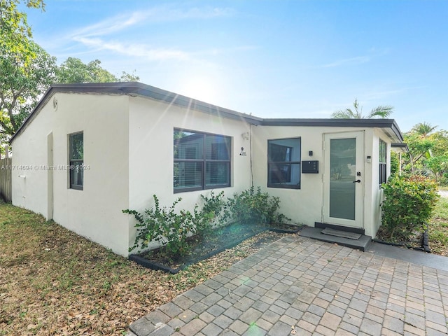 view of front of home featuring a patio