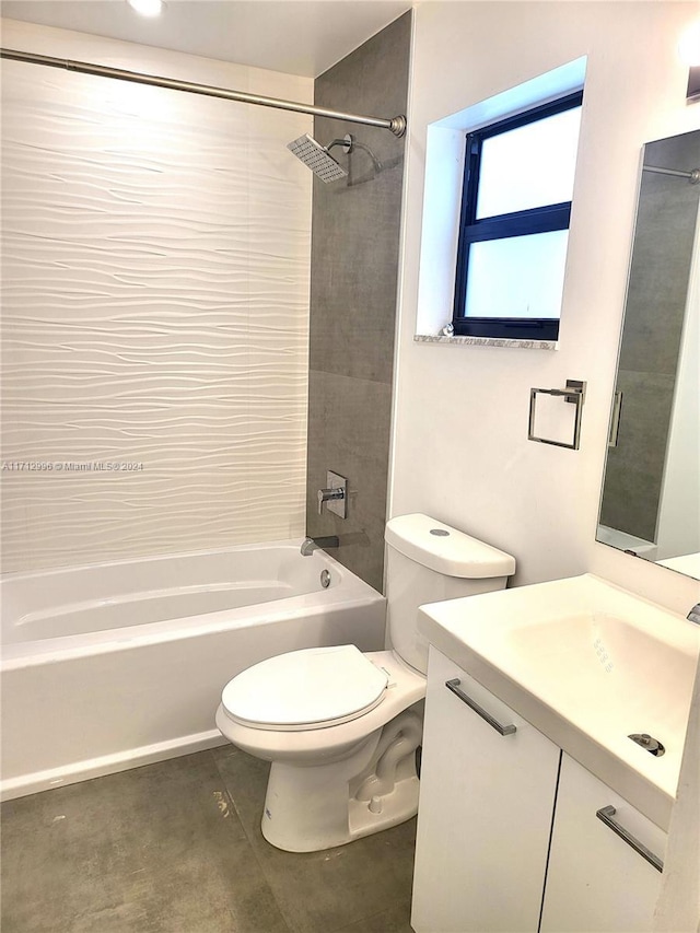 full bathroom featuring vanity, toilet, and tiled shower / bath combo