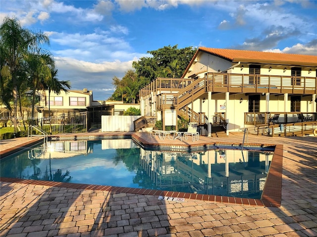 view of swimming pool with a patio area