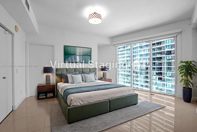 60 SW 13th St Unit 1700, Miami, FL 33130 - bedroom with tile patterned floors