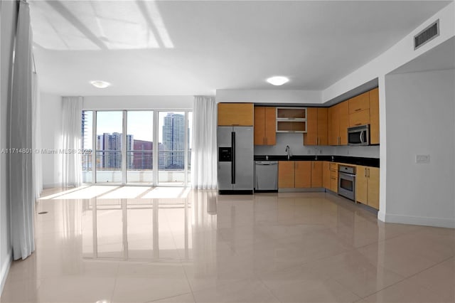 kitchen featuring stainless steel appliances, visible vents, a view of city, open shelves, and dark countertops