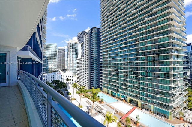 balcony featuring a city view