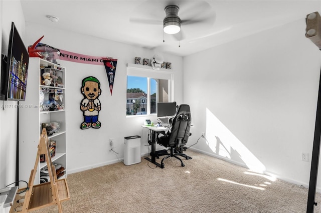 office with carpet, ceiling fan, and baseboards