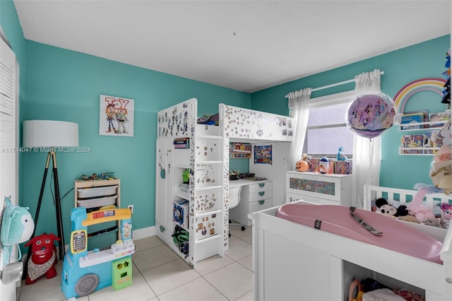 bedroom featuring light tile patterned floors