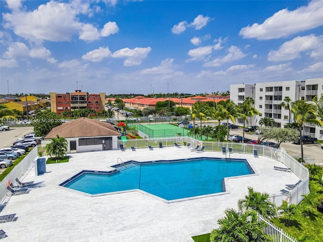 view of swimming pool with a patio area