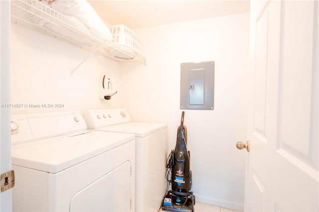 laundry area featuring washing machine and dryer and electric panel