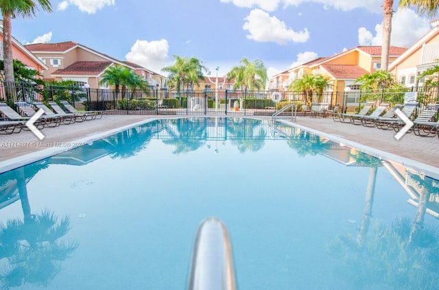 view of swimming pool featuring a patio area