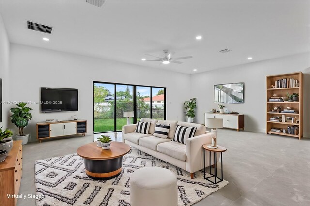 living room featuring ceiling fan