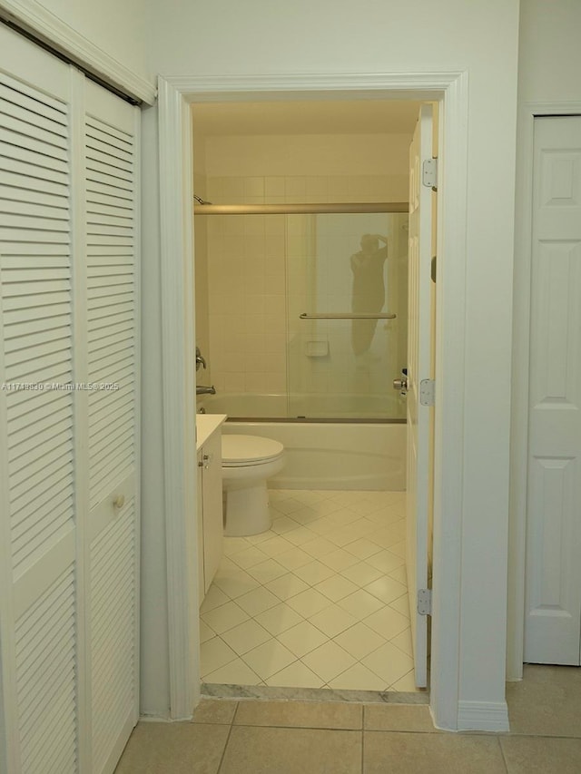 full bathroom with toilet, vanity, shower / bathtub combination, and tile patterned floors