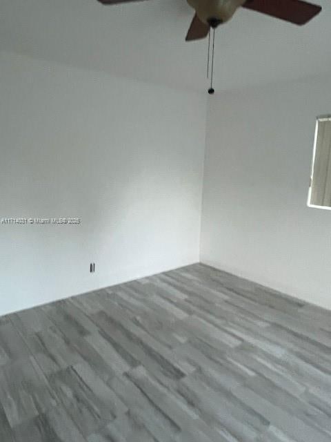 spare room with light hardwood / wood-style floors